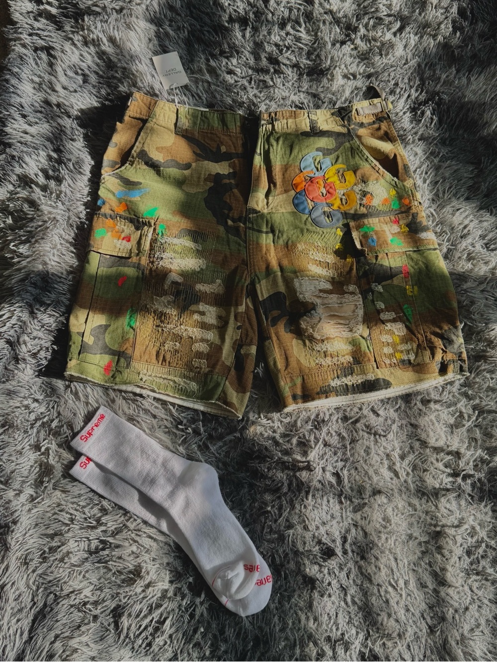 Camouflage Cargo Shorts with Multicolor Paint Accents